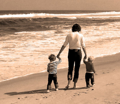 Heather and boys walking on beach - 1983