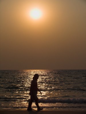 Walkers at sunset