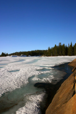 A look west across a frozen Lake Alpine
