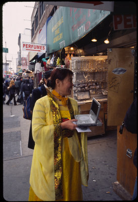 Saleswoman in ancient Chinese costume.jpg