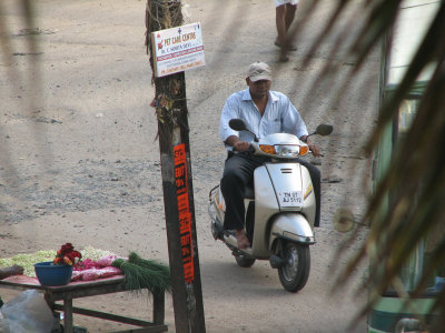 Passing by on a scooter