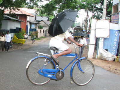 Blue bicycle in rain