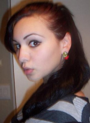 Aracely Coronado modeling our Sweet Romance Cherries Jubilee Earrings!