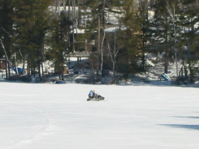 Snowmobile on Hills Pond