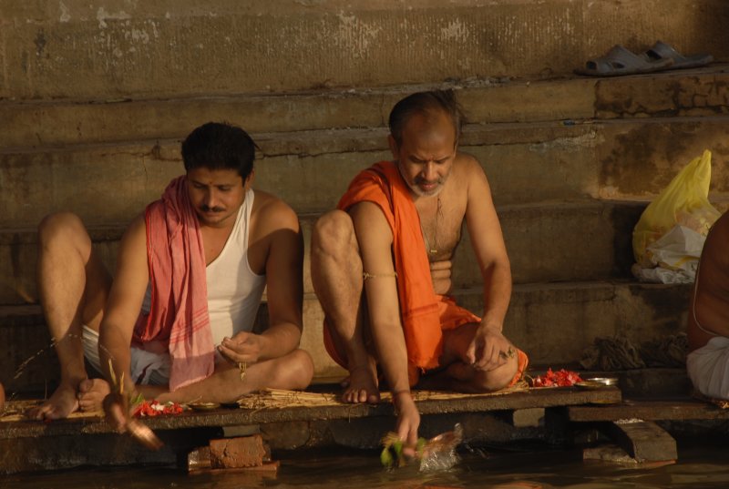 Offering prayers to the river at dawn