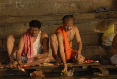 Offering prayers to the river at dawn