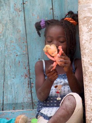 Mozambique -- playing with her doll