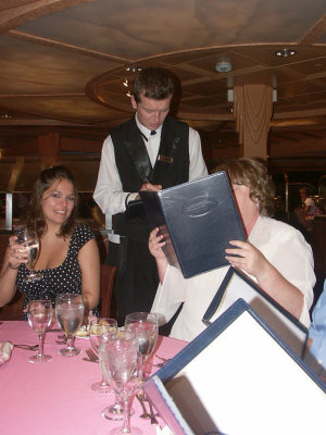 Anna hams it up while Catalin takes Susan's order.