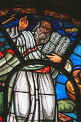 This stained glass window depicts Moses with the Ten Commandments -- numbered in Ge'z.