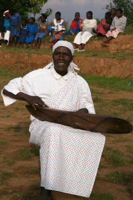 This man played a traditional Rwandan instrument while singing about the many highlights of Rwanda.