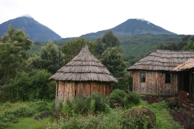 Mt. Gahinga Lodge with two of the Virunga Volcanoes in the background: Muhabura and Gahinga.