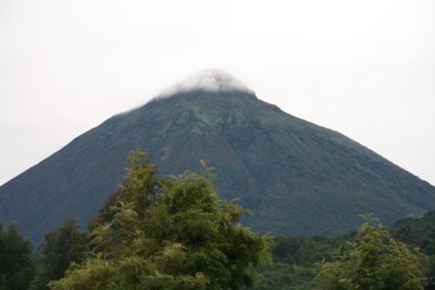 Mt. Muhabura is a commanding presence towering over the surrounding landscape.