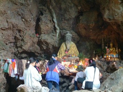 Statute in Cave of Sacred Fish -- Mae Hong Son