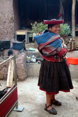 An Andean woman shows off her handicrafts