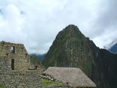 The first buildings of the citadel, with Wayna Picchu in the background