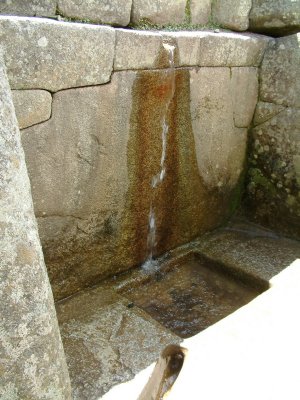 Water flows into Machu Picchu through channels carved hundreds of years ago