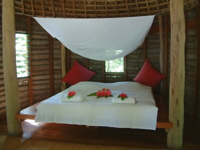 Bed with mosquito net on Fafa Island