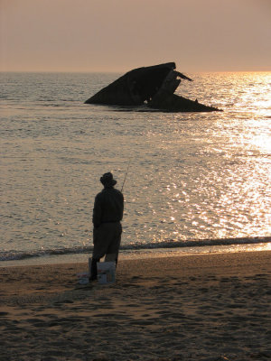Fisherman and S.S. Atlantus - Sunset Beach, NJ