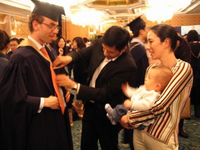 Raj, Joao, his wife and our youngest MBA yet!!!!! Cap was a bit big for him, but he wore it like a man!!!