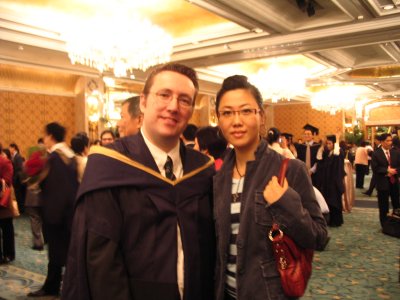 Jessica and I (my guest and photographer)... ooops, seems I eat too much and popped a button on the gown... haha