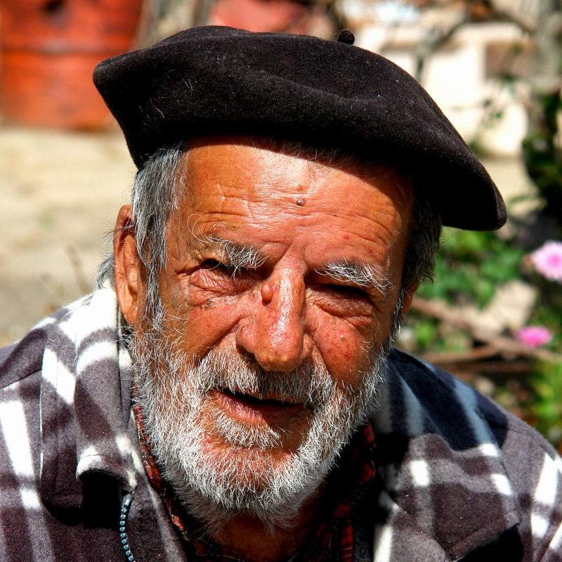 Old man sitting in the sun