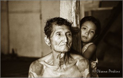 Chief of a Longhouse with Grandaughter 1, Sarawak