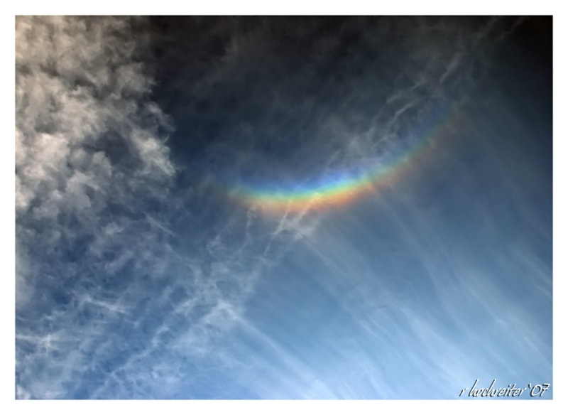 Clouds and rainbow