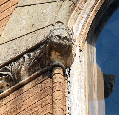 Carved Face on 2nd Story Window of Yeatts Furniture