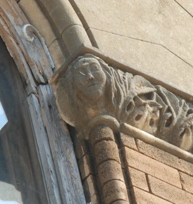 Carved Face on 2nd Story Window