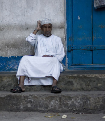 stonetown man at a blue door_w.jpg