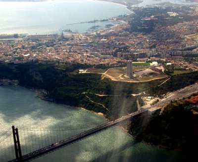 Aerial view of Lisbon's bridge and statue