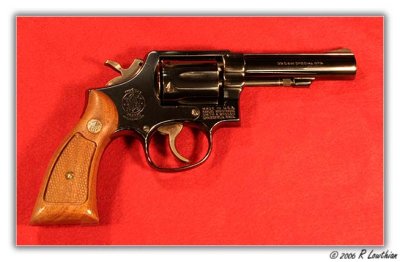 S&W Model 10, 4 inch Heavy Barrel, 6 shot, .38 Special Cal. Revolver