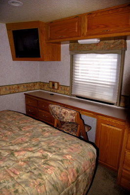 04- Master Bedroom with right rear slider open (desk / vanity)