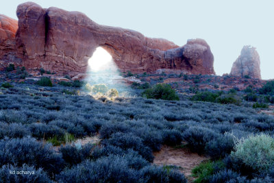 Sunbeams at sunrise thru the North Window, Arches National Park