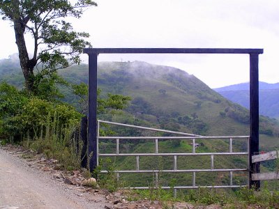 Gate overlooking hills near Monteverde.JPG
