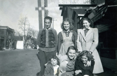 Mary, Marian, Elinora and 3 unidentified people in front of Mac's Lunch in Iroquois