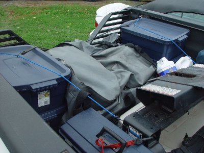 THE BOX OF THE TOW TRUCK IS FULL OF STORAGE BOXES-ALL WATERPROOF