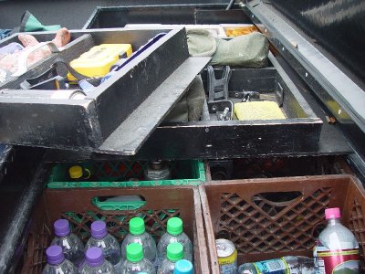 CUSTOM MADE SLIDING TOP SHELVES IN THE TRUCK TOOL BOX ARE GREAT