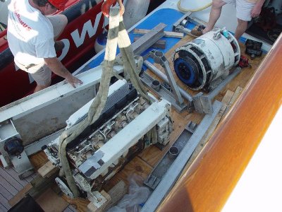 IT WAS BEING LOADED INTO A REPAIR BOAT ALONG SIDE