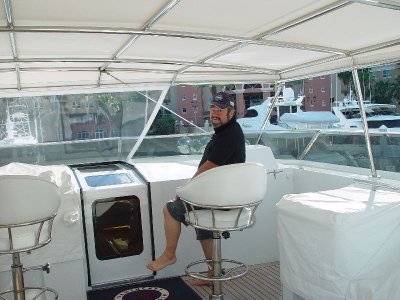 DON ON THE UPPER BRIDGE BEHIND THE CONTROLS-BOAT WASN'T MOVING BUT IT WAS FUN