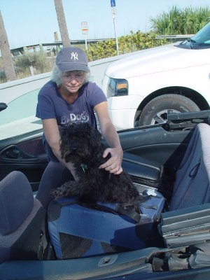 SARA IS GETTING CHARLIE OUT OF HIS BOX FOR THE BEACH