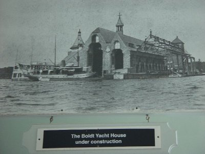THIS IS A PICTURE OF THE MASSIVE BOAT HOUSE ON A ISLAND CLOSE TO THE CASTLE