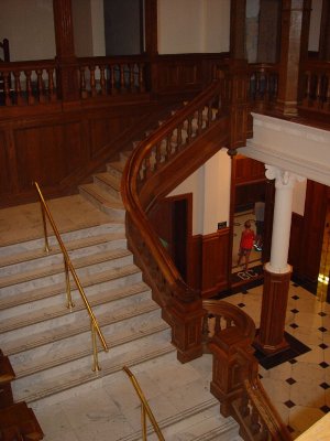 WOODEN STAIRCASE TO THE MAIN FLOOR