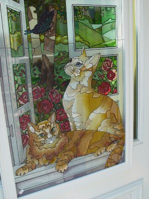 AND OH THE STAIN ED GLASS -LOOK AT THESE CATS