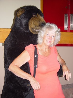 THE VISITOR'S CENTER'S BARNEY THE BEAR LOVED SARA AND GAVE HER A BIG HUG