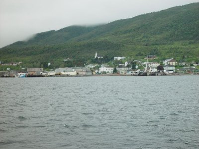 THE TINY TOWN OF WOODY POINT FROM THE WATER FERRY