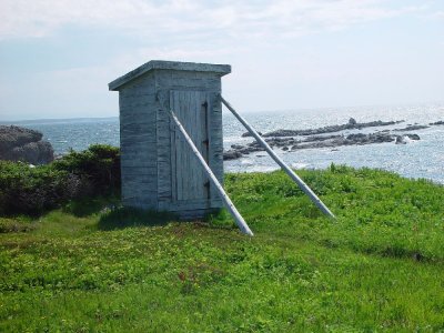 THIS WAS AN OUTDOOR PRIVY ON THE COW HEAD SHORE-CAN YOU TELL WHICH WAY THE WIND BLOWS?