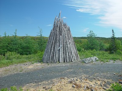 WE SAW HUNDREDS OF THESE WOOD TEEPEES