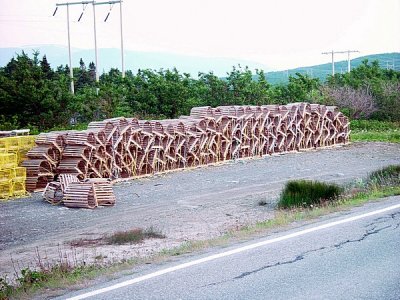 LOBSTER TRAPS BY THE THOUSANDS DOT THE ROADS OF NEWFOUNDLAND