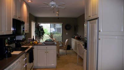 Kitchen features cabinets with Imron (boat) paint, corian countertops, new appliances